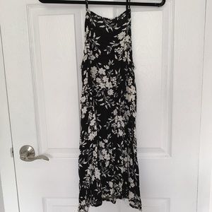 Women’s black floral dress.